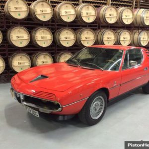 Photo of a red Alfa Romeo Montreal