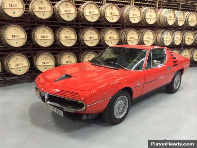 Photo of a red Alfa Romeo Montreal