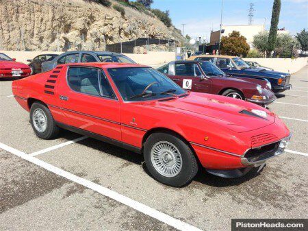 Photo of a red Alfa Romeo Montreal