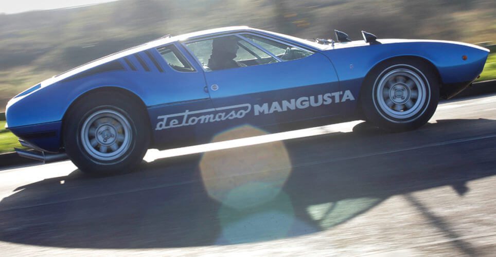 Side shot of a De Tomaso Mangusta driving