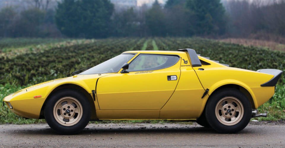 Side view of a yellow Lancia Stratos HF Stradale