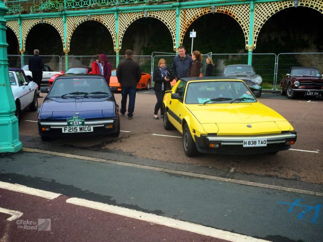 Blue and yellow Bertone x1/9s at the London to Brighton Classic Car Run