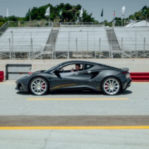 Jensen Button drives the new Lotus Emira at Laguna Seca